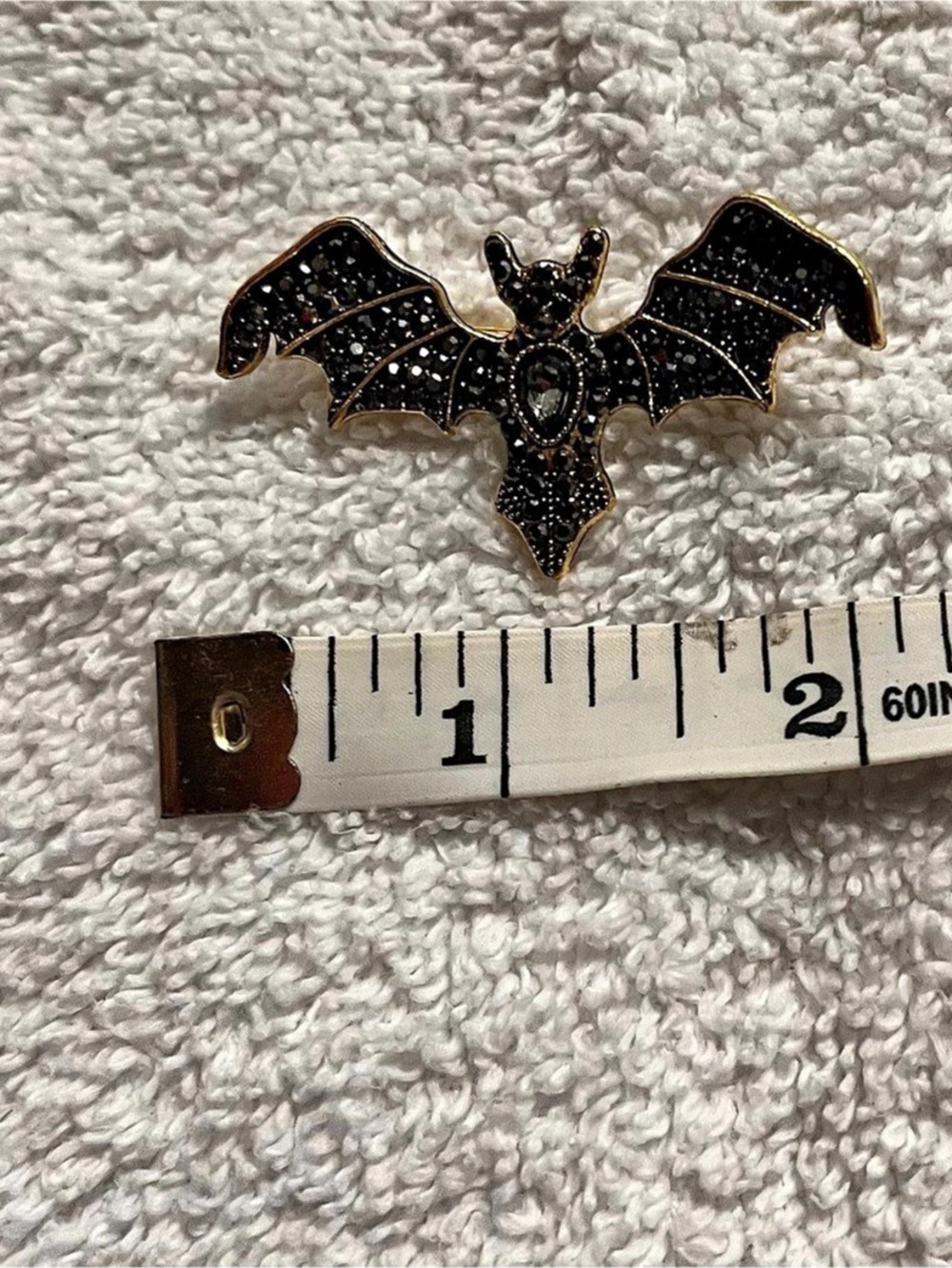 Bat Brooch in Black & Gold Like New